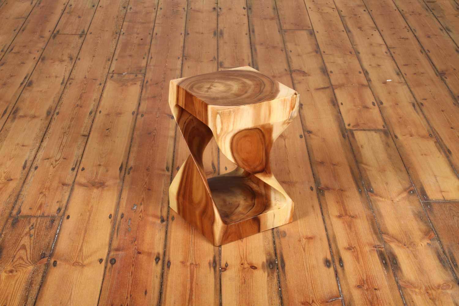 Gelung Stool angled front view showing carved teak twist