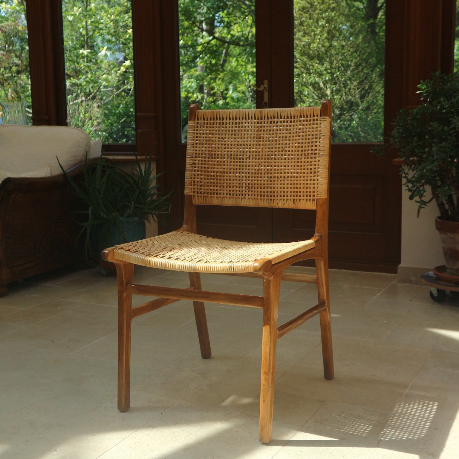 Sora Chair in indoor space surrounded by natural materials