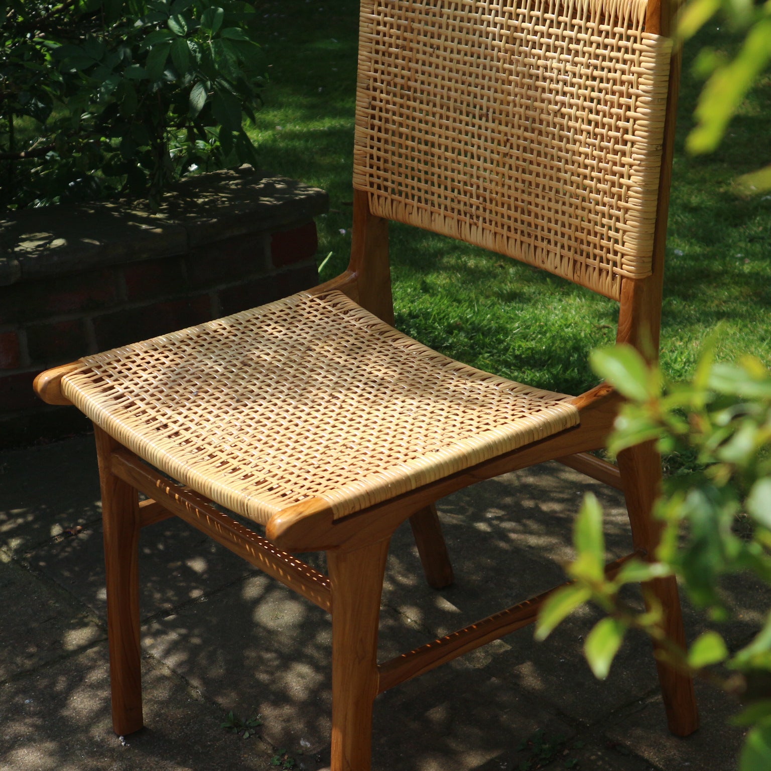 Sora Chair in outdoor setting with natural sunlight and shadow