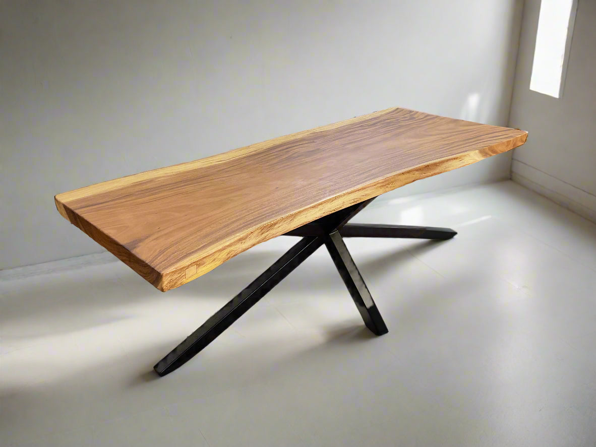 Angled view of Tua Table showing thickness of top and splayed leg structure