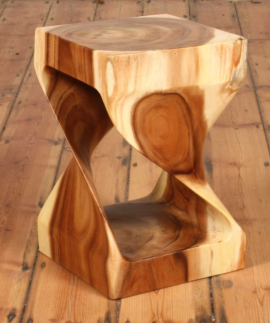Close-up of Gelung Stool's spiral midsection and carved interior