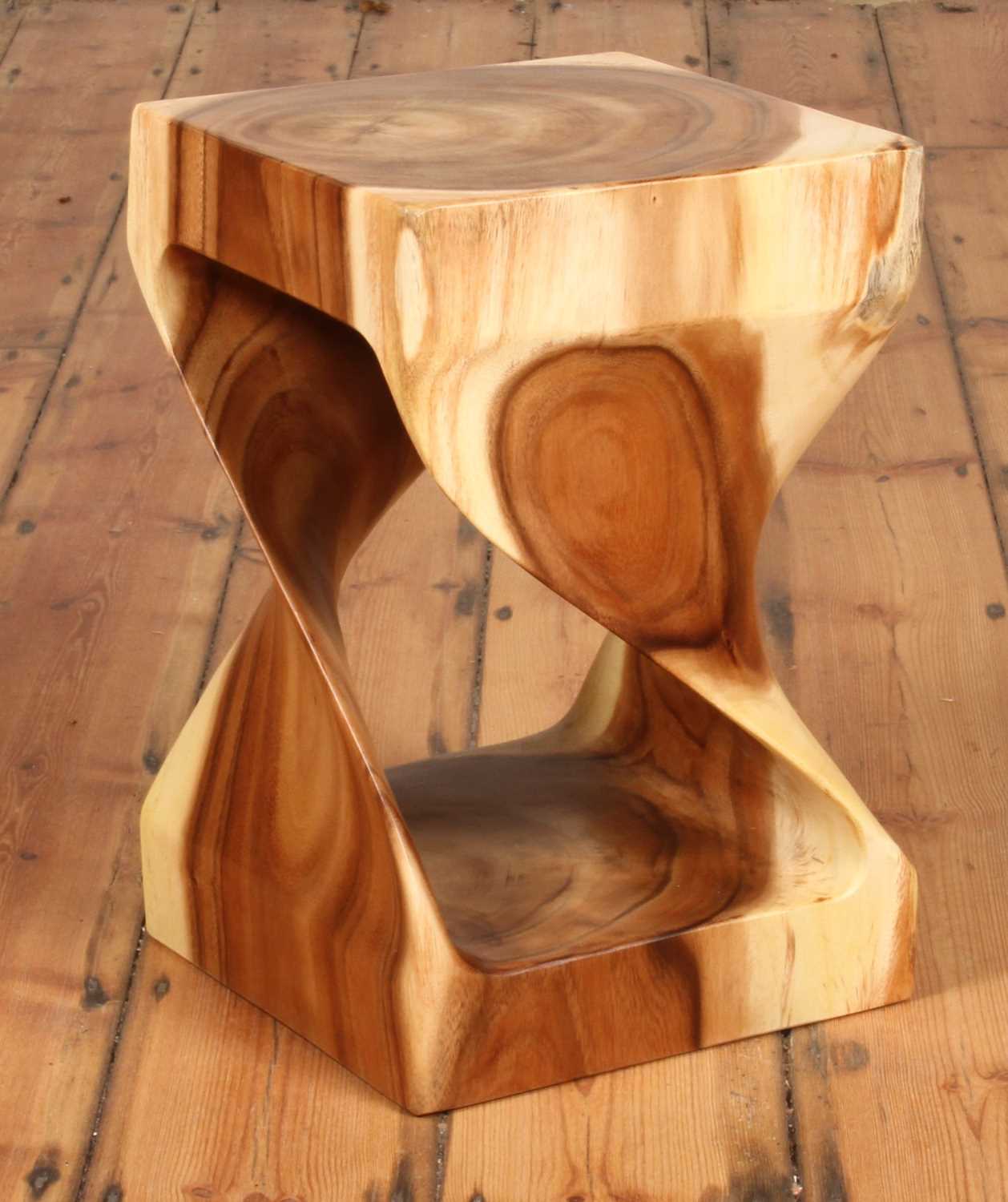 Close-up of Gelung Stool's spiral midsection and carved interior