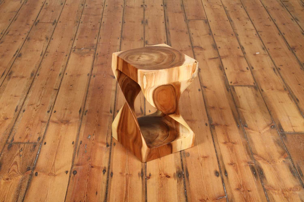 Gelung Stool angled front view showing carved teak twist