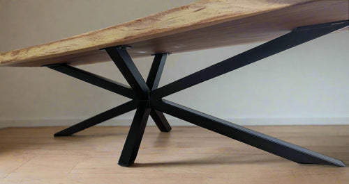 Close-up of aged teak grain on Tua Table’s surface