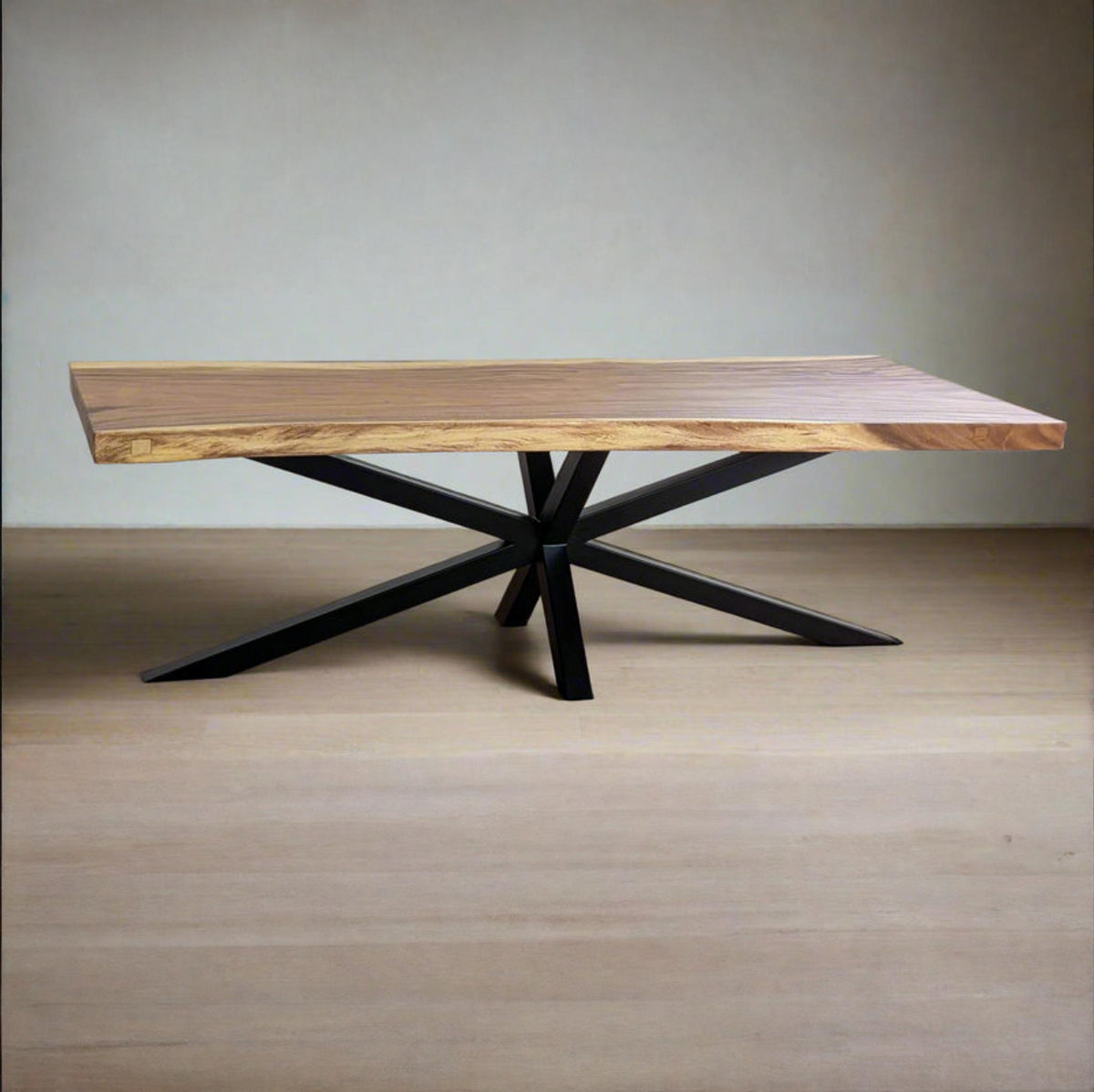 Side profile of Tua Table showing natural wood grain and sculptural base